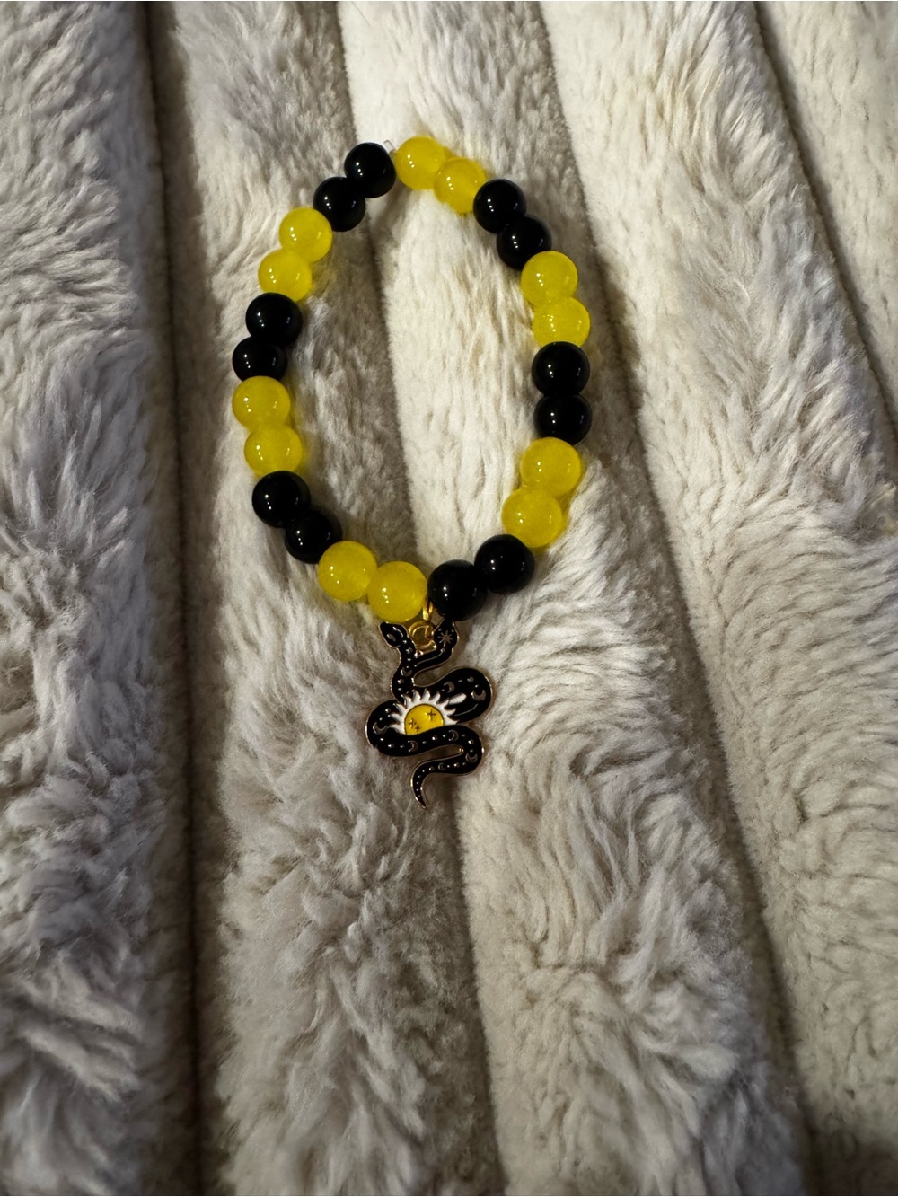 Yellow & Black Beaded Bracelet with Snake Sun Charm